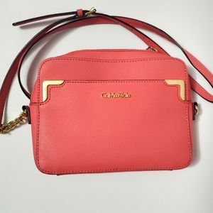 Calvin Klein cross body bag coral color